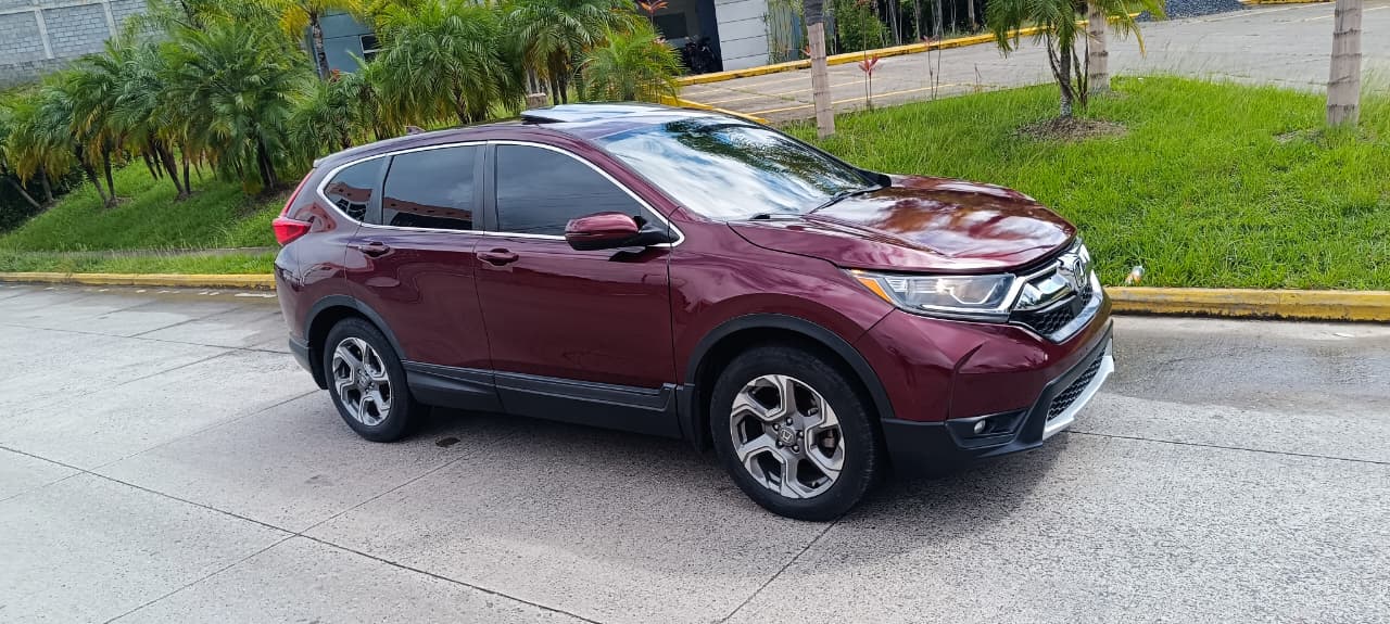 Honda CR-V 2018 color vino, vista lateral derecha, en venta en Honduras